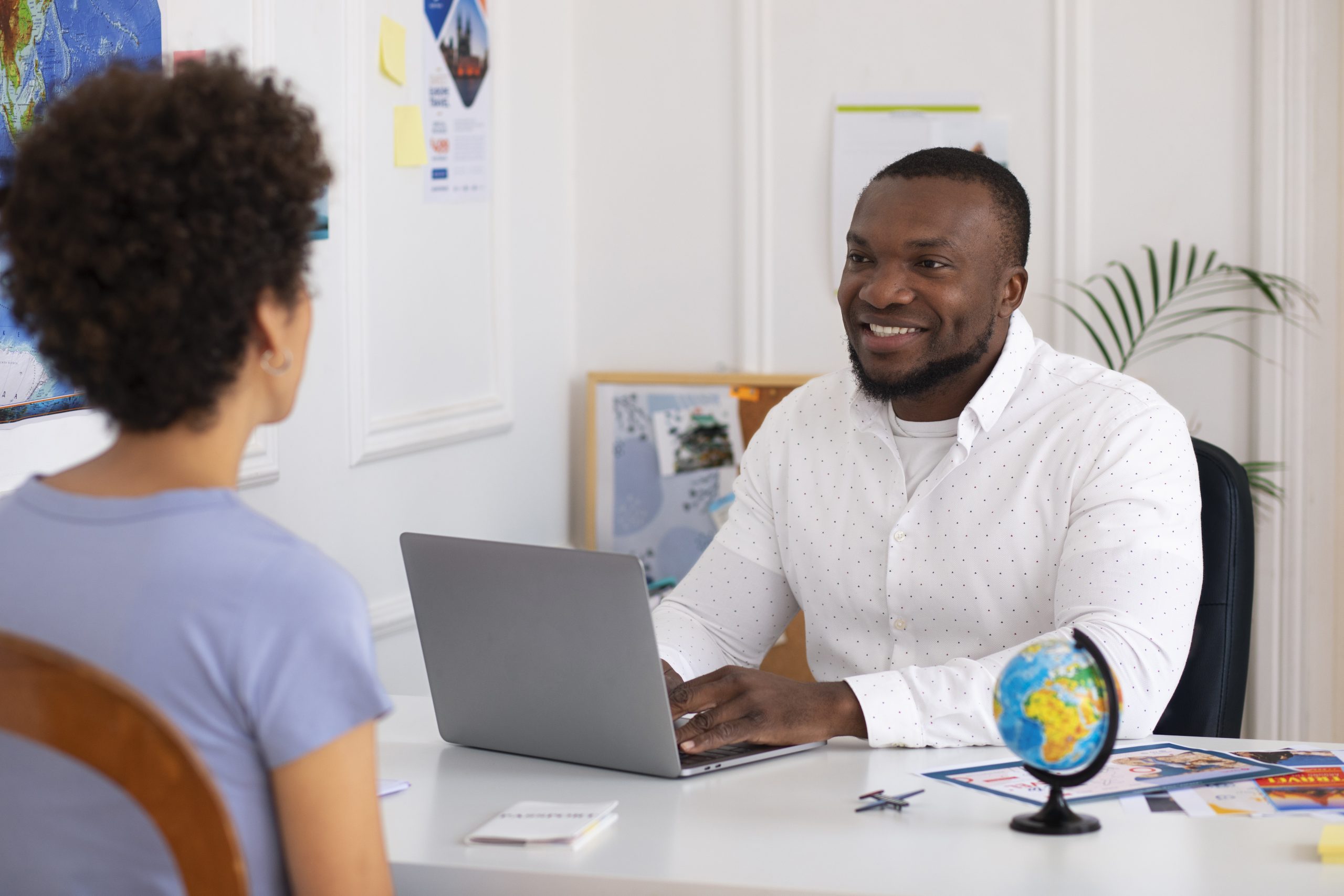 medium-shot-people-travel-agency-office